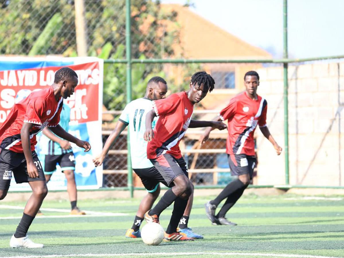 Competitive football match at Kidza Arena